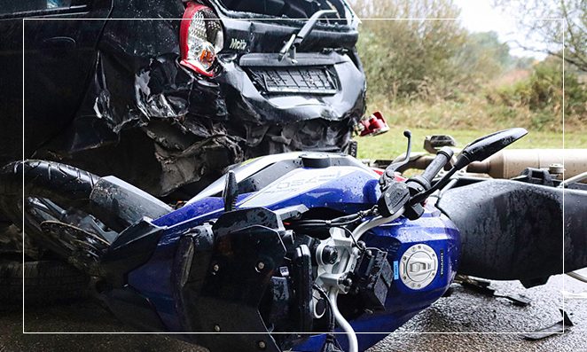 A motorcycle that is sitting in the grass.