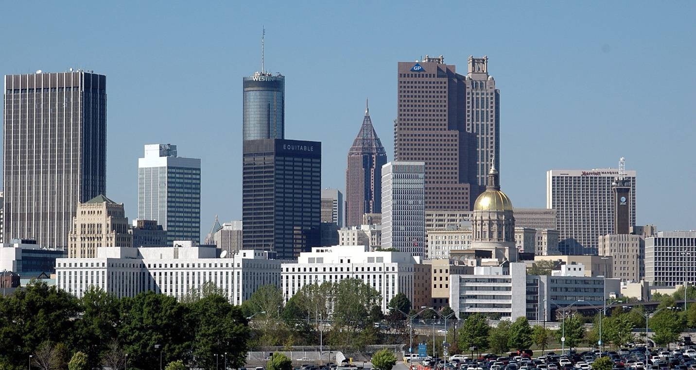 A view of the city skyline from across the street.